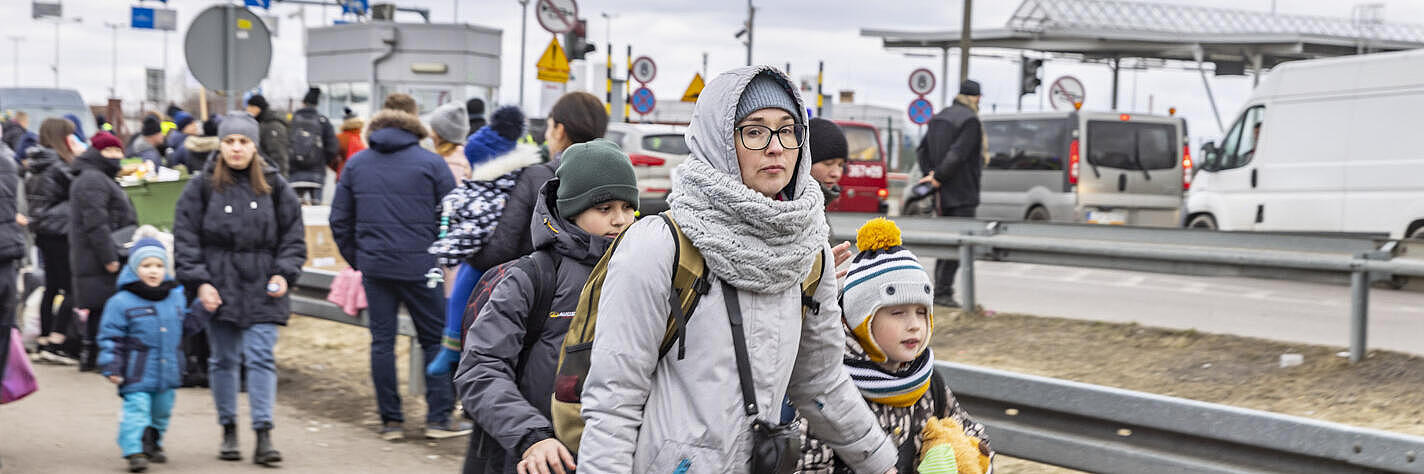 Eine ukrainische Familie auf der Flucht.